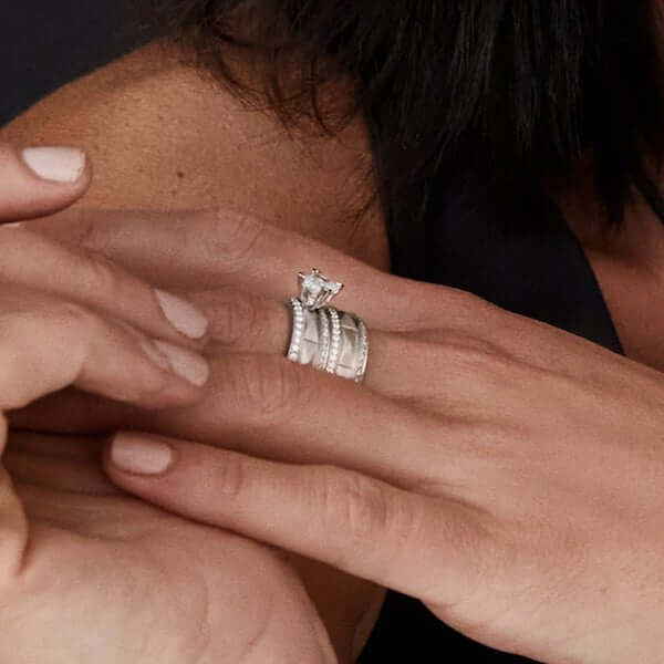 Engagement ring and wedding band pairing, modern platinum design